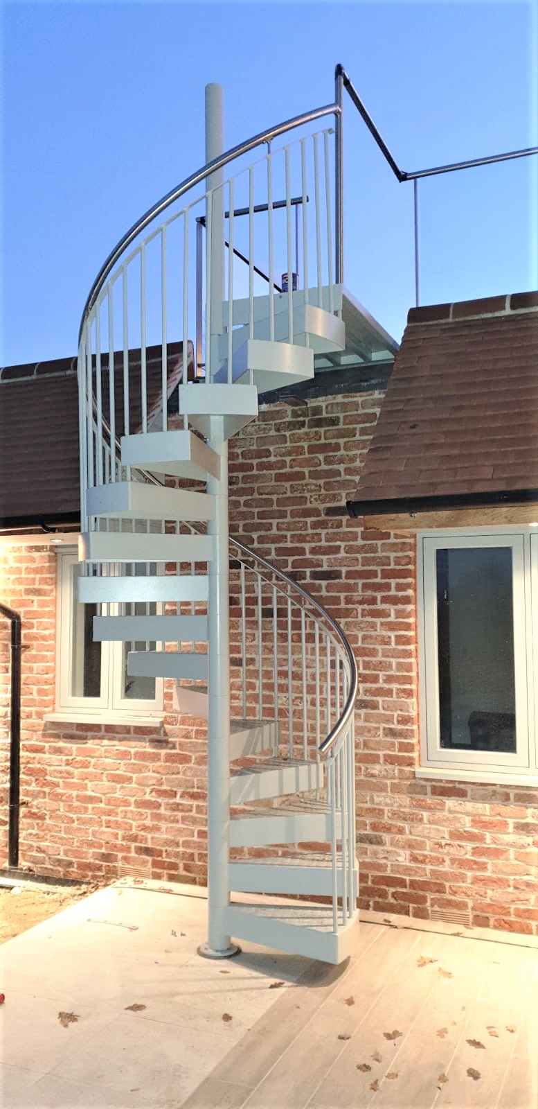 Spiral Staircase photo showing stainless steel handrail and powder coated and galvanised frame