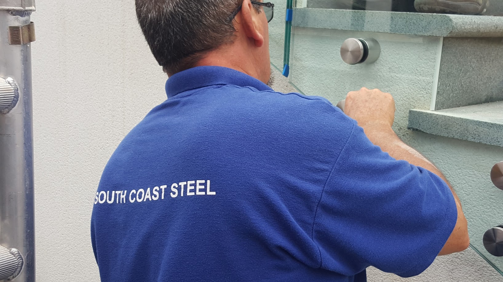 South Coast Steel Frameless Balustrade Installation of steel buttons